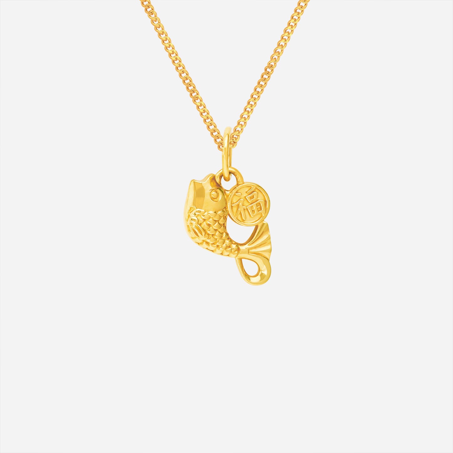 fortune fish pendant in 24k yellow gold, detailed fish motif with charm symbolizing abundance and prosperity.