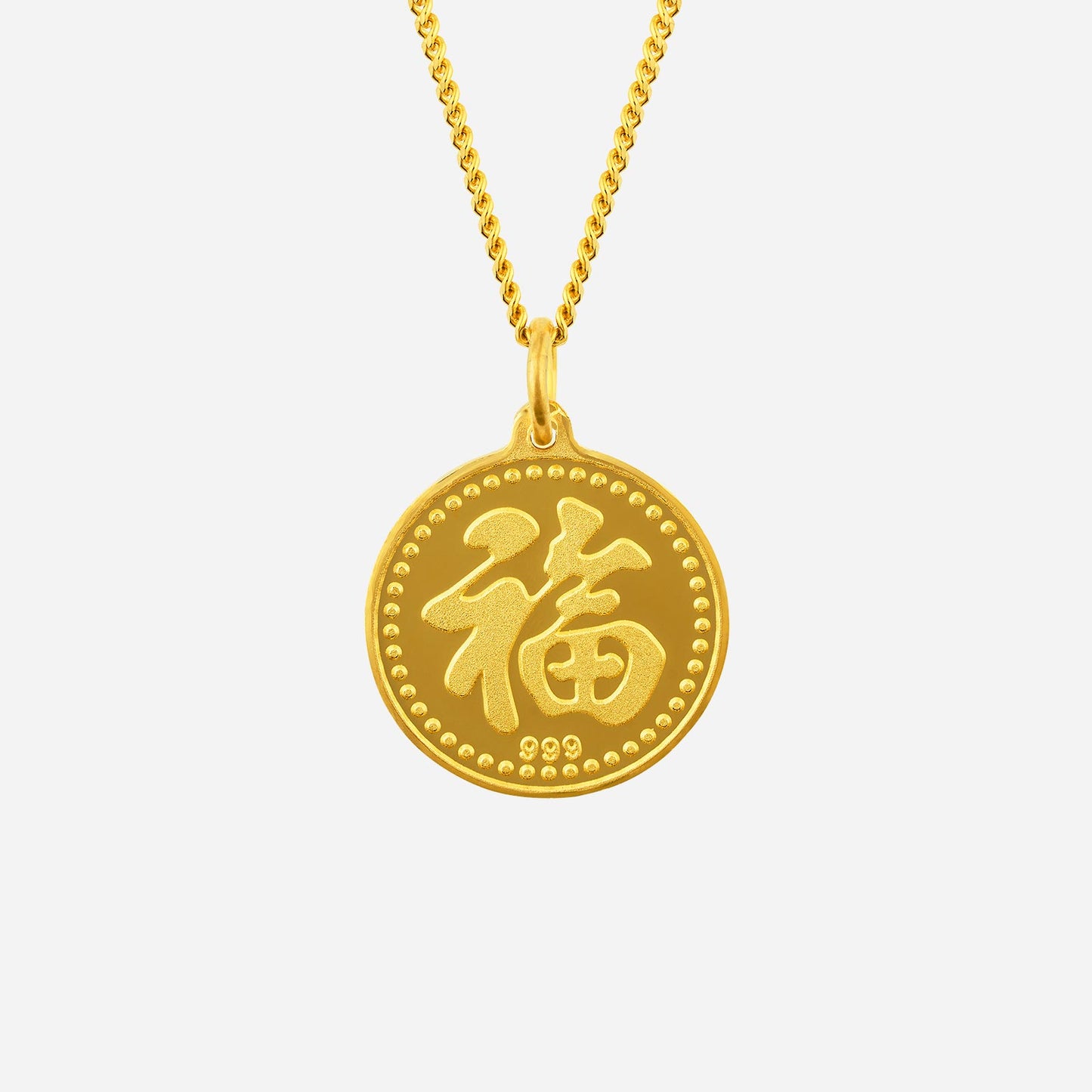 24k yellow gold monkey pendant featuring a detailed design with circular shape and decorative border.