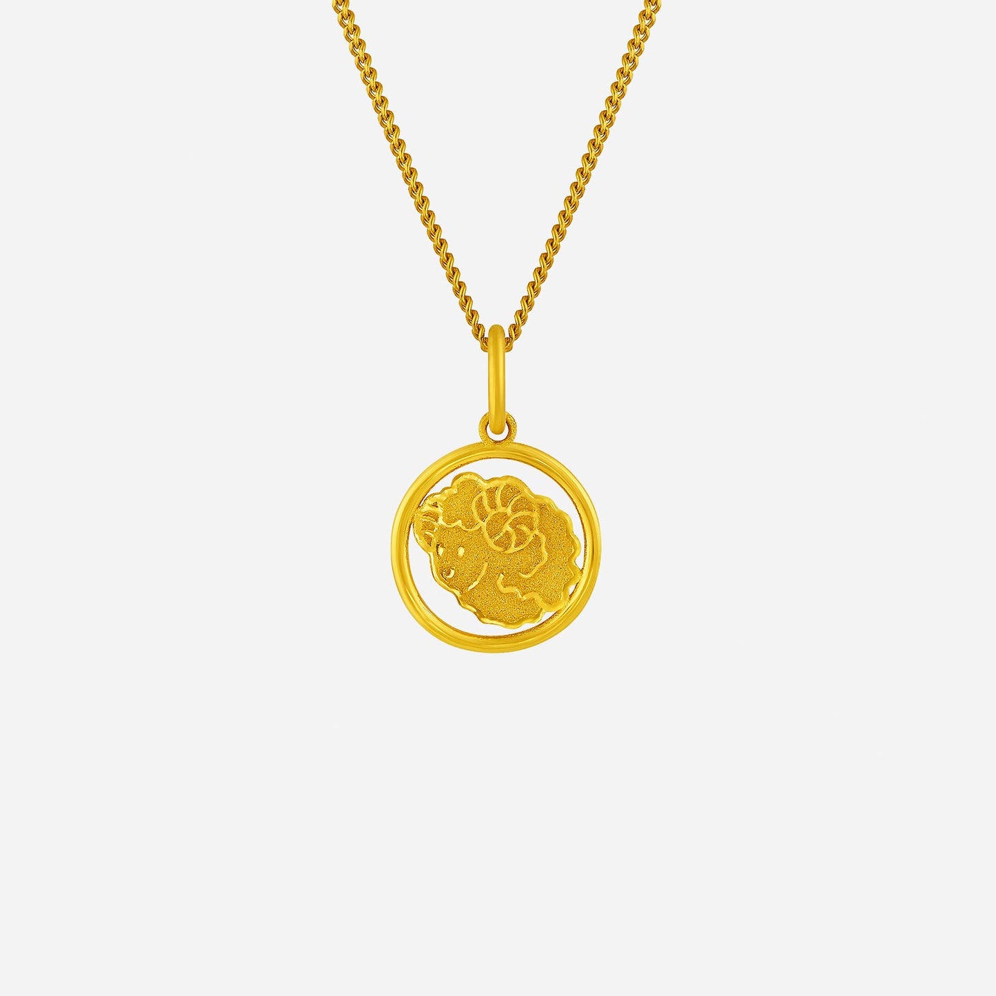 harmonies of joy goat pendant in 24k yellow gold with intricate goat design, suspended from a delicate chain.