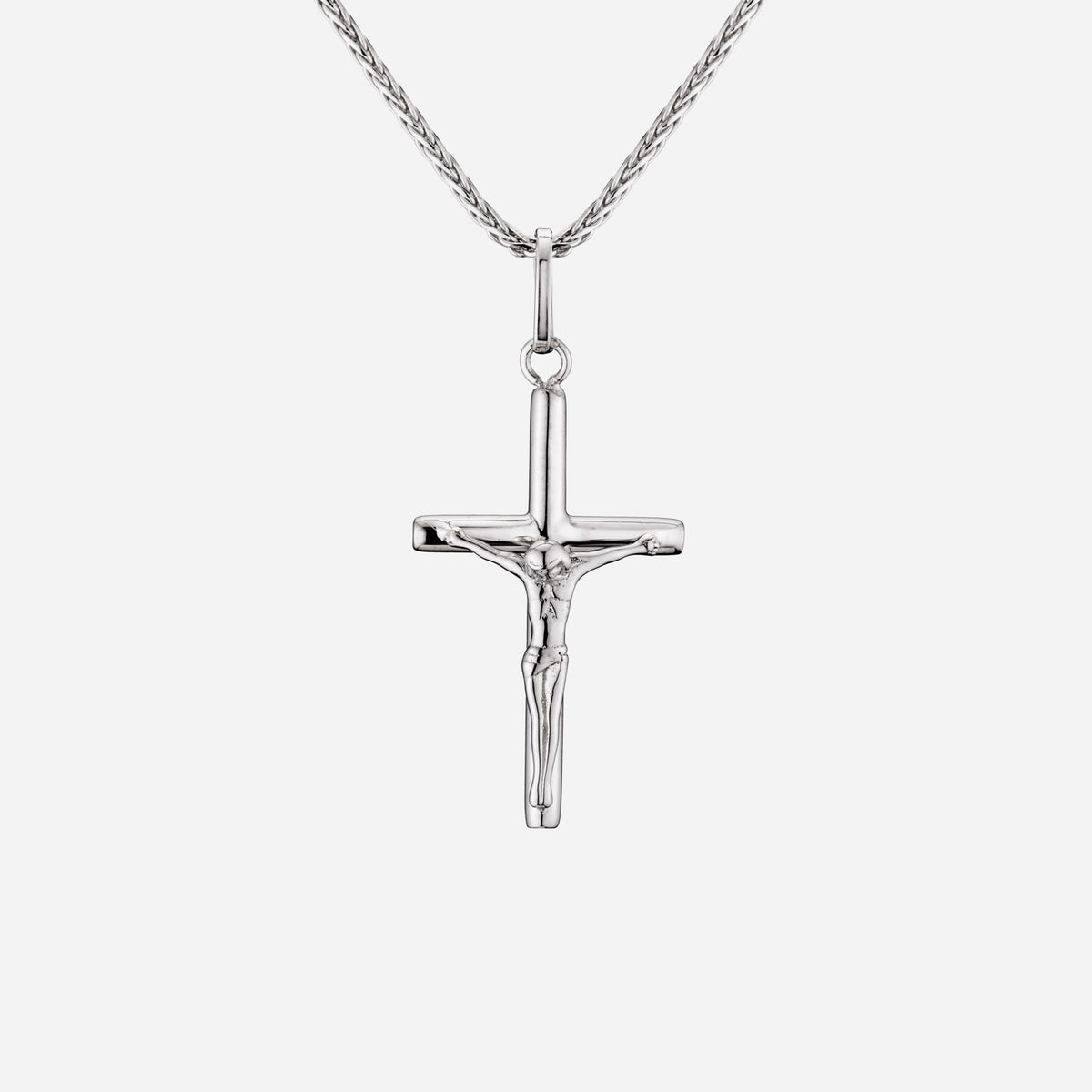 38mm crucifix pendant in 18k white gold with intricate detailing and polished finish, chain not included.
