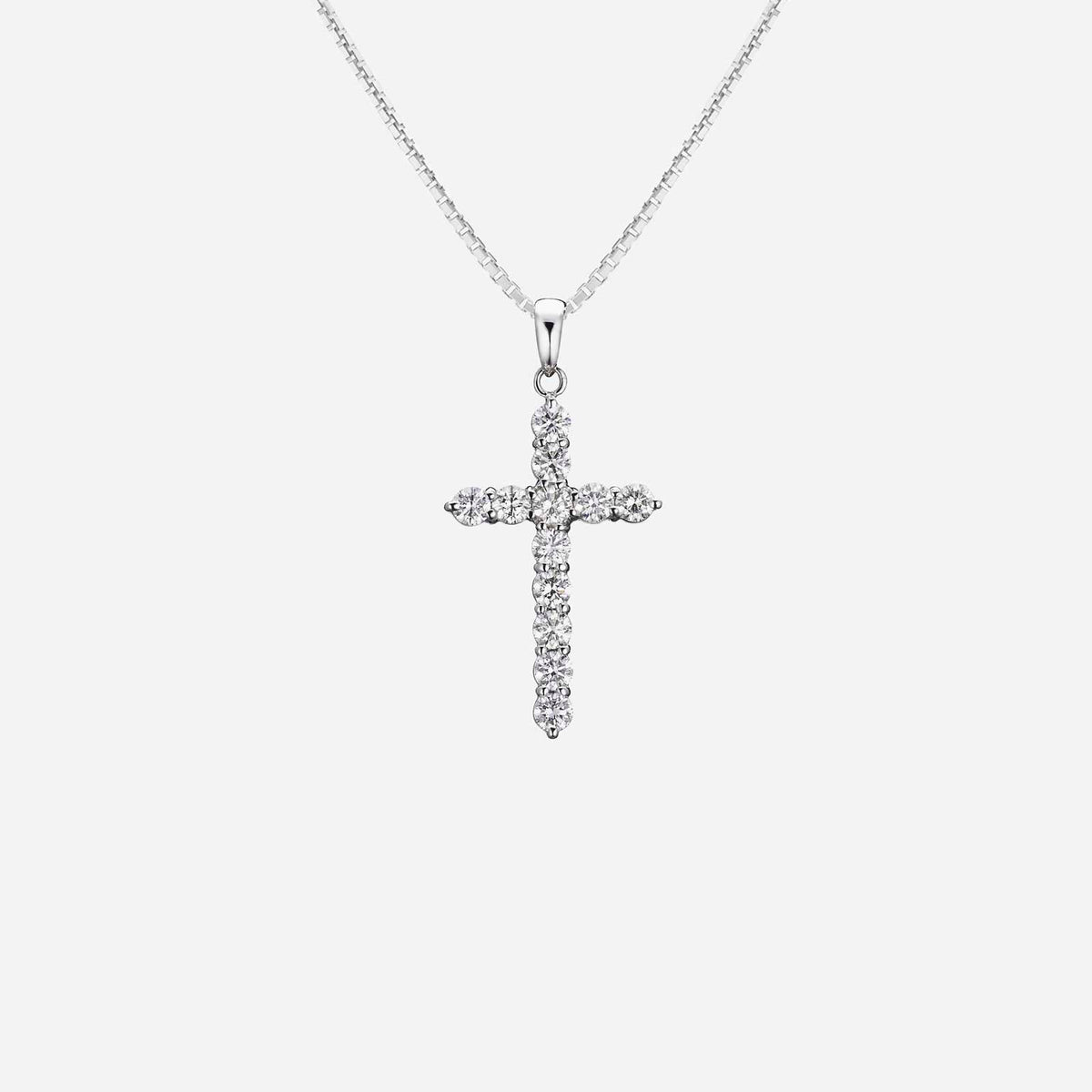 cross pendant in sparkling diamonds, set in 18k white gold, featuring a classic cross design. chain not included.