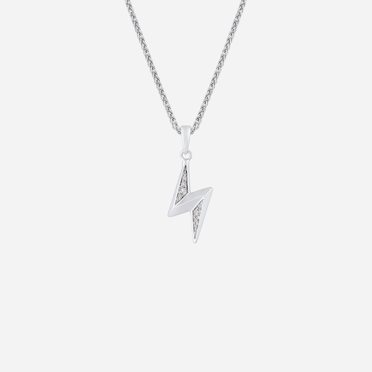 lightning bolt pendant in 18k white gold with pavé-set diamonds for a bold, edgy look. chain not included.