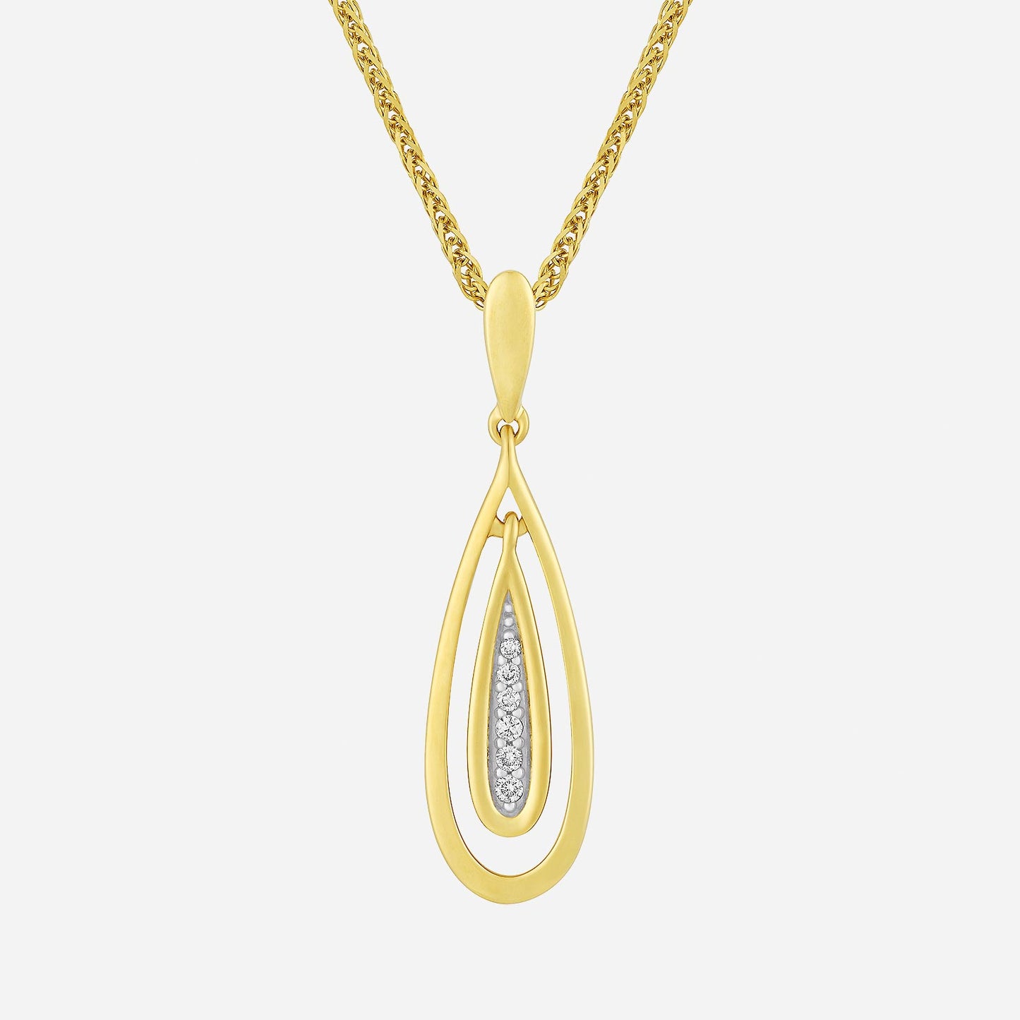 dewdrop diamond pendant in yellow gold featuring a dual-tone design with sparkling diamonds inside.