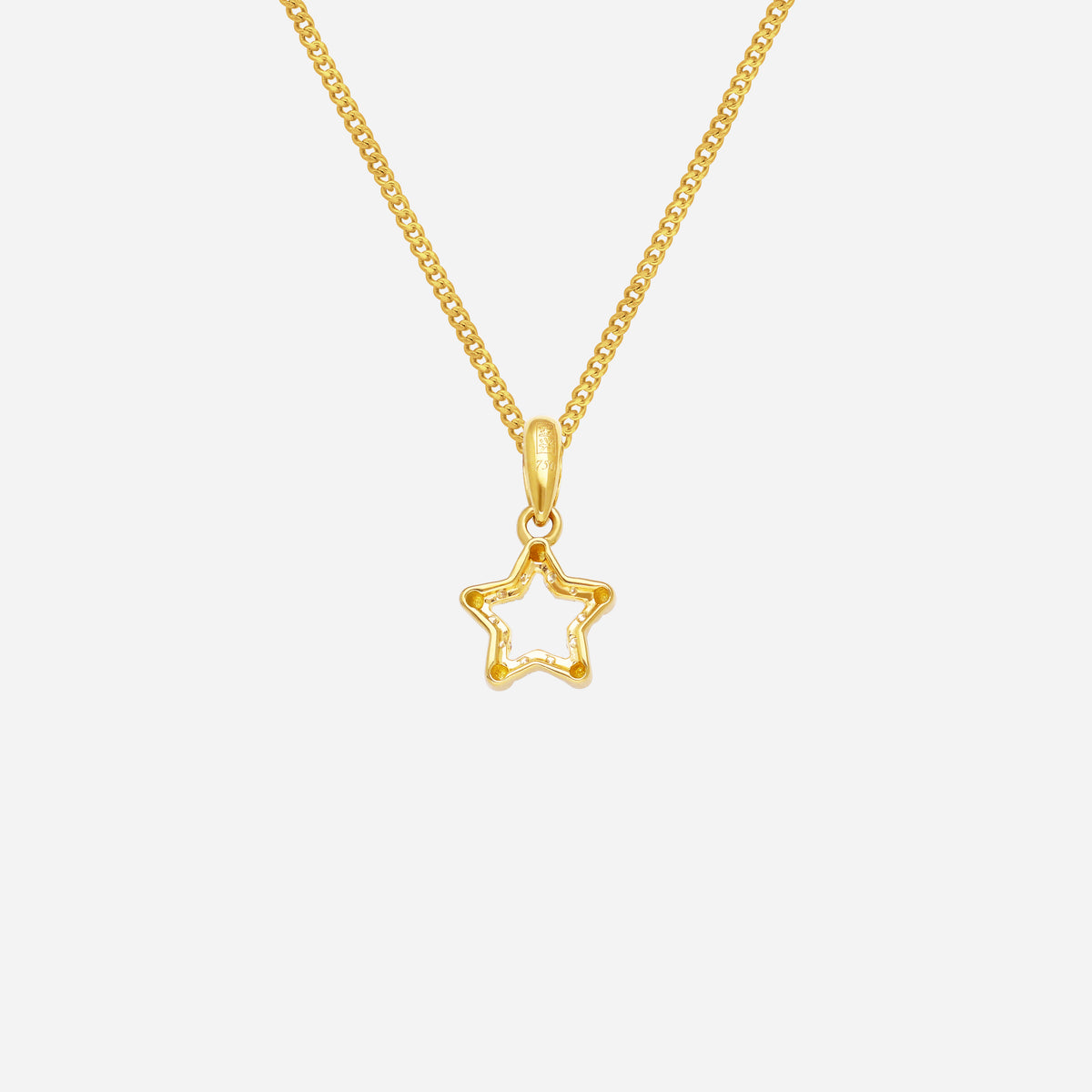 twinkling star pendant in 18k yellow gold adorned with petite diamonds on a delicate chain.