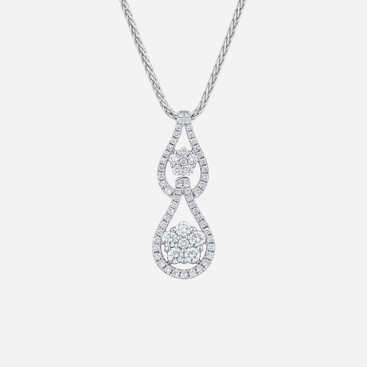 double teardrop diamond pendant in 18k white gold, featuring sparkling diamonds in graceful shapes. chain sold separately.