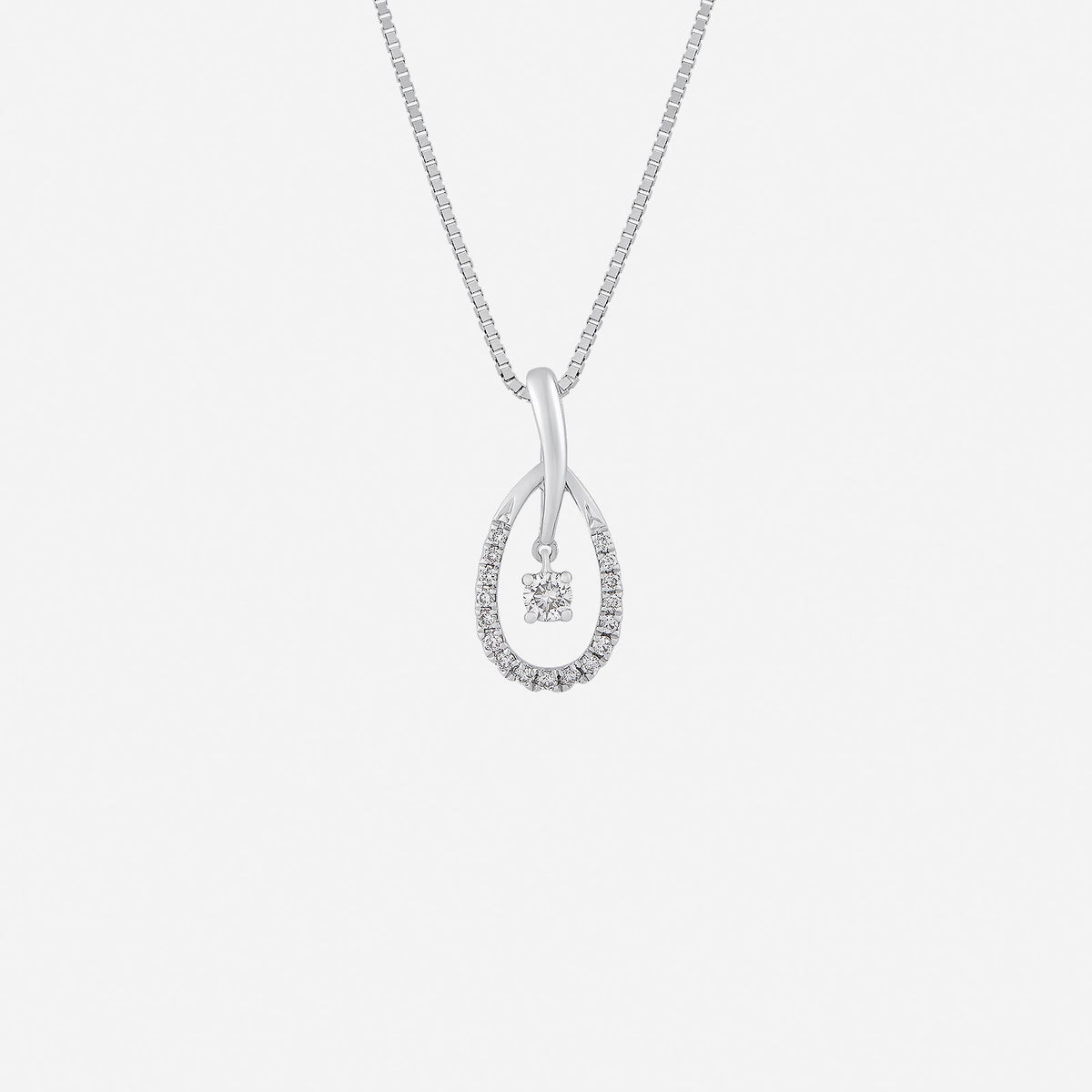 timeless loop diamond pendant in 18k white gold with pavé-set teardrop frame and center diamond. elegant and graceful design.