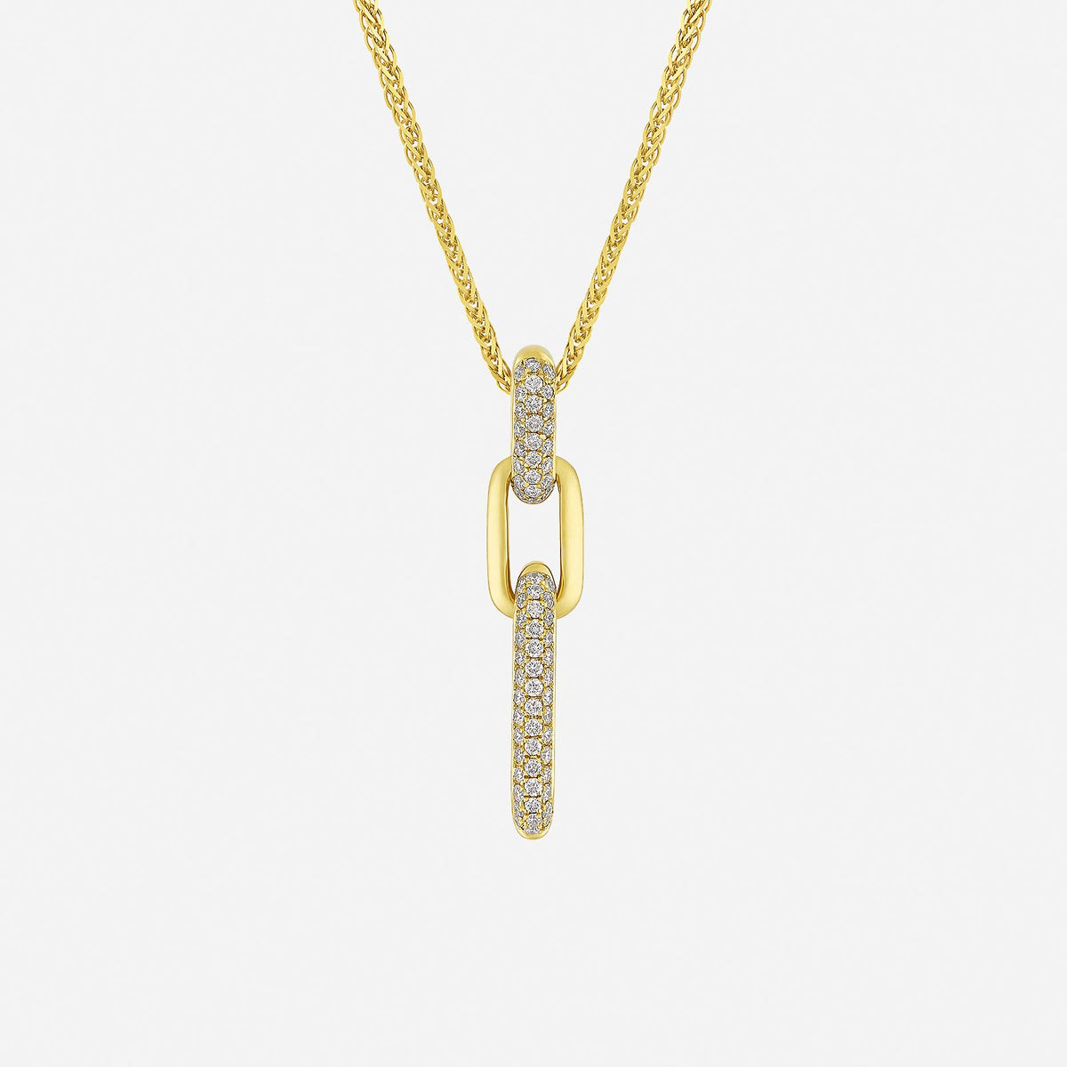 elegant interlock diamond pendant in 18k yellow gold with two linked designs, one adorned with sparkling diamonds.