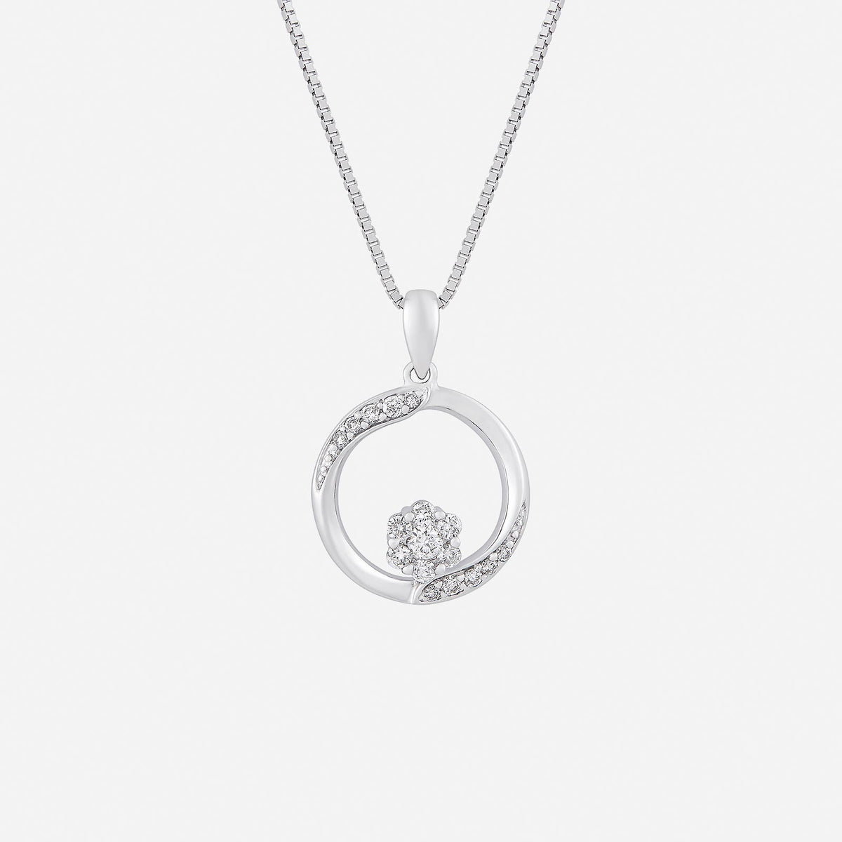 circle of elegance diamond pendant in 18k white gold featuring a floral design and subtle diamond accents.