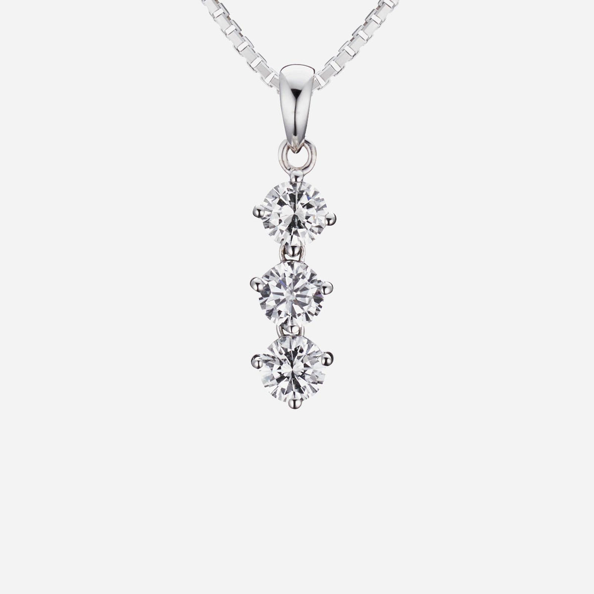 trio diamond pendant in 18k white gold with three round brilliant diamonds, each 0.15 carats in elegant design.