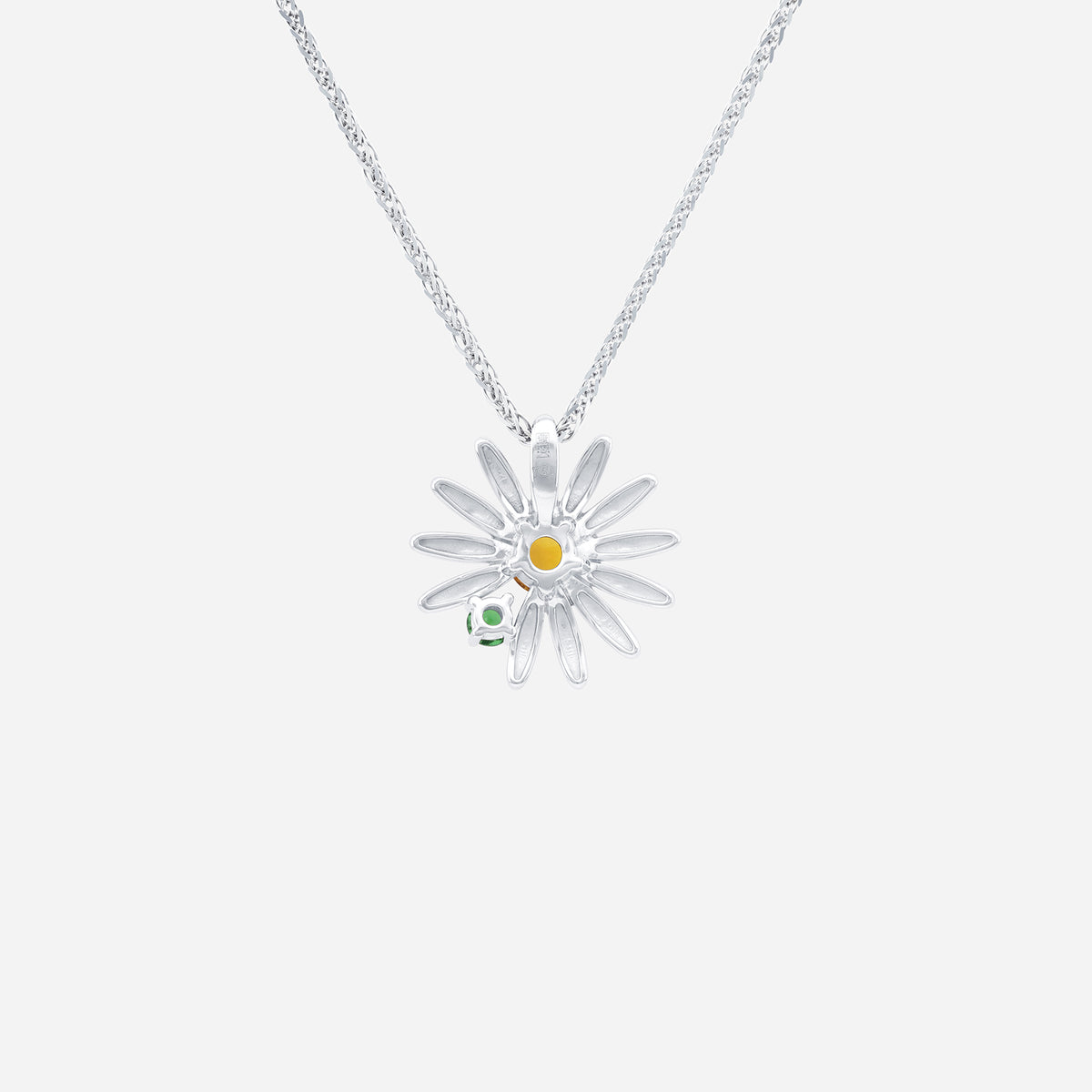 daisy pendant in 18k white gold featuring a yellow sapphire center and tsavorite accent. floral design with chain.