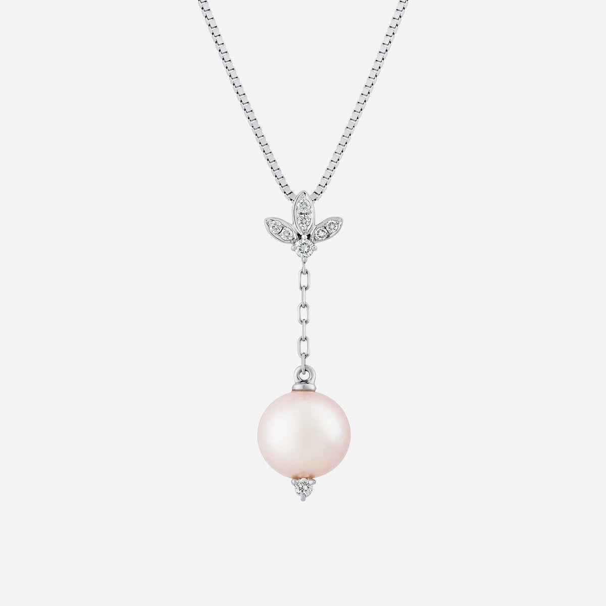 freshwater pearl pendant with diamond-studded leaf motif, set in 18k white gold, elegant and graceful design.