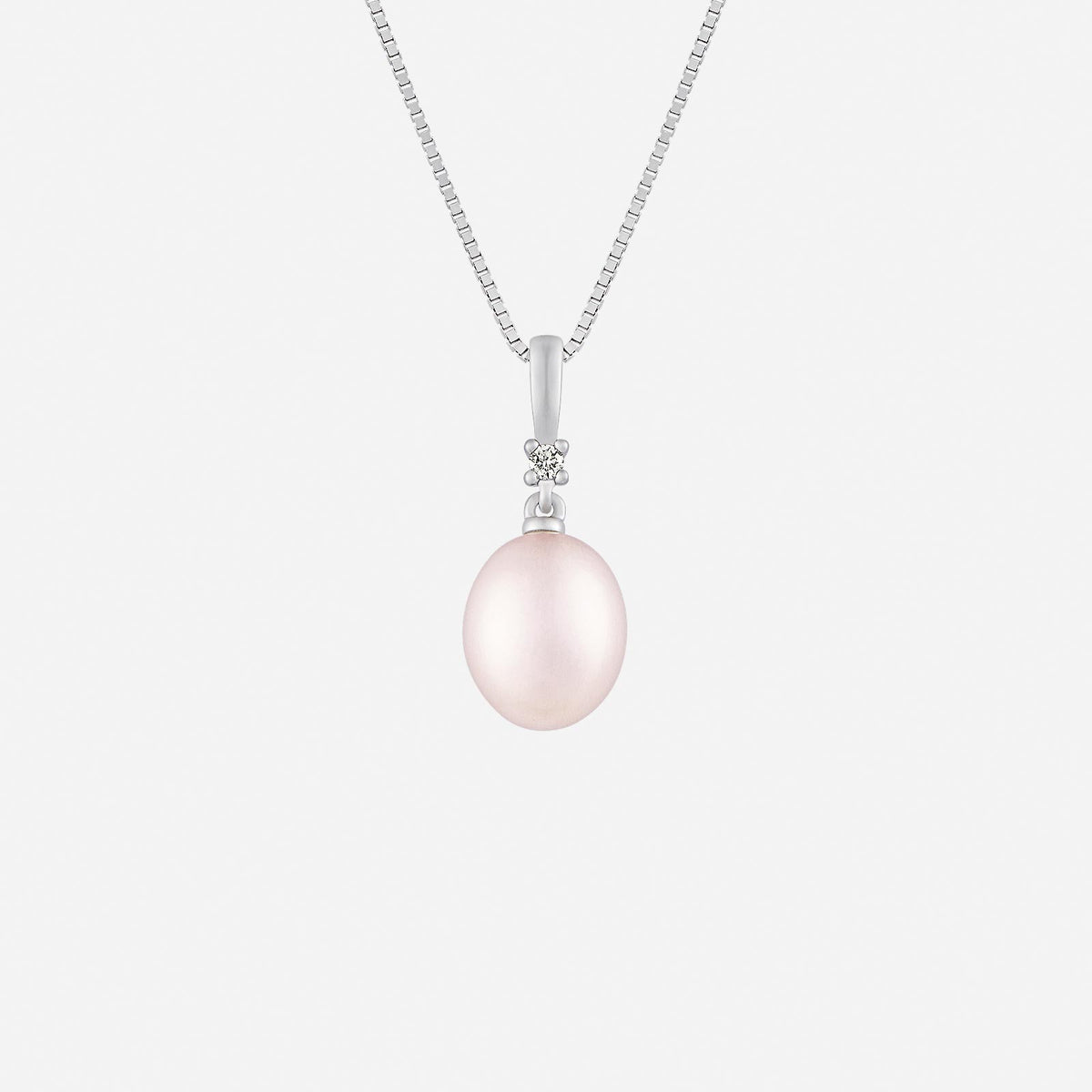 freshwater pearl pendant with diamond accents in 18k white gold, featuring a luminous pink oval pearl.