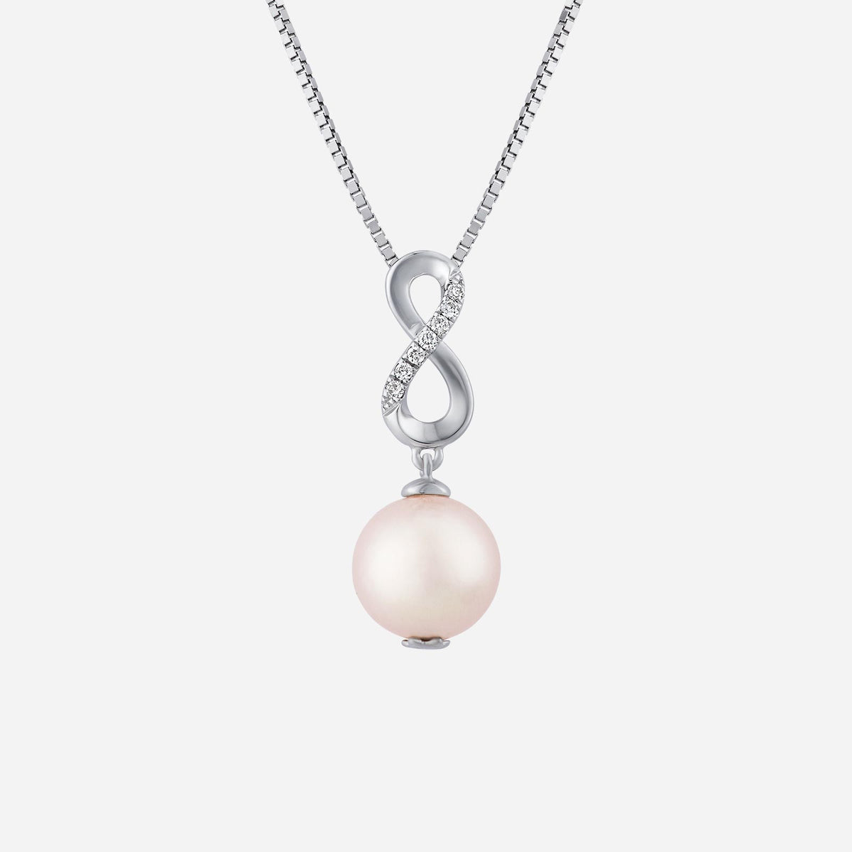freshwater pearl pendant with diamond accent in infinity design, set in 18k white gold. elegant and timeless.