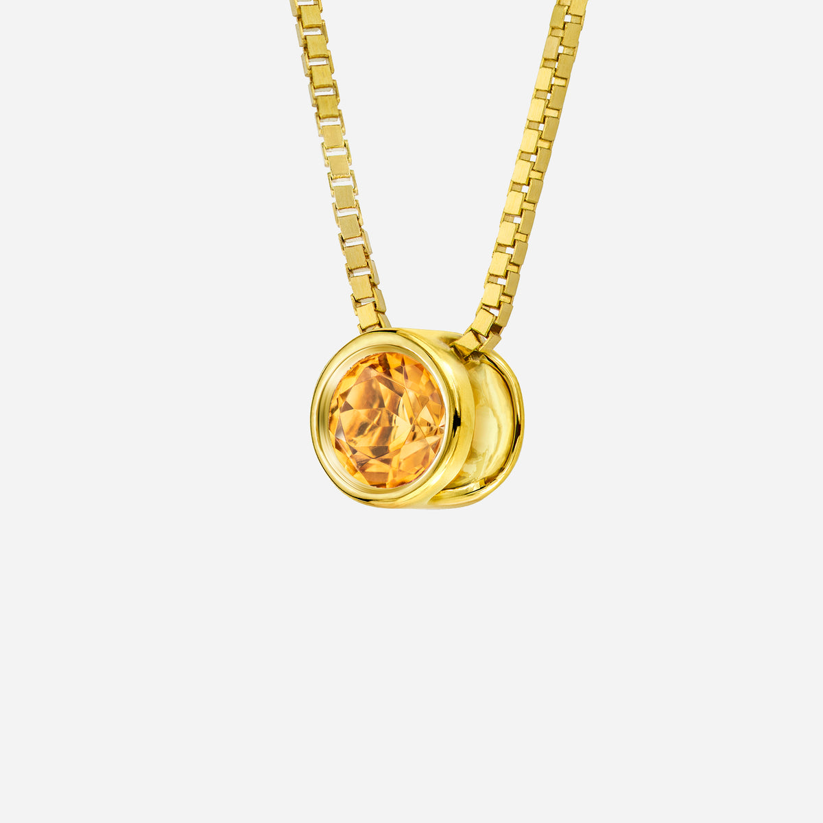 citrine pendant in 18k yellow gold with a round gemstone and sleek setting, designed for november birthstone celebrations.
