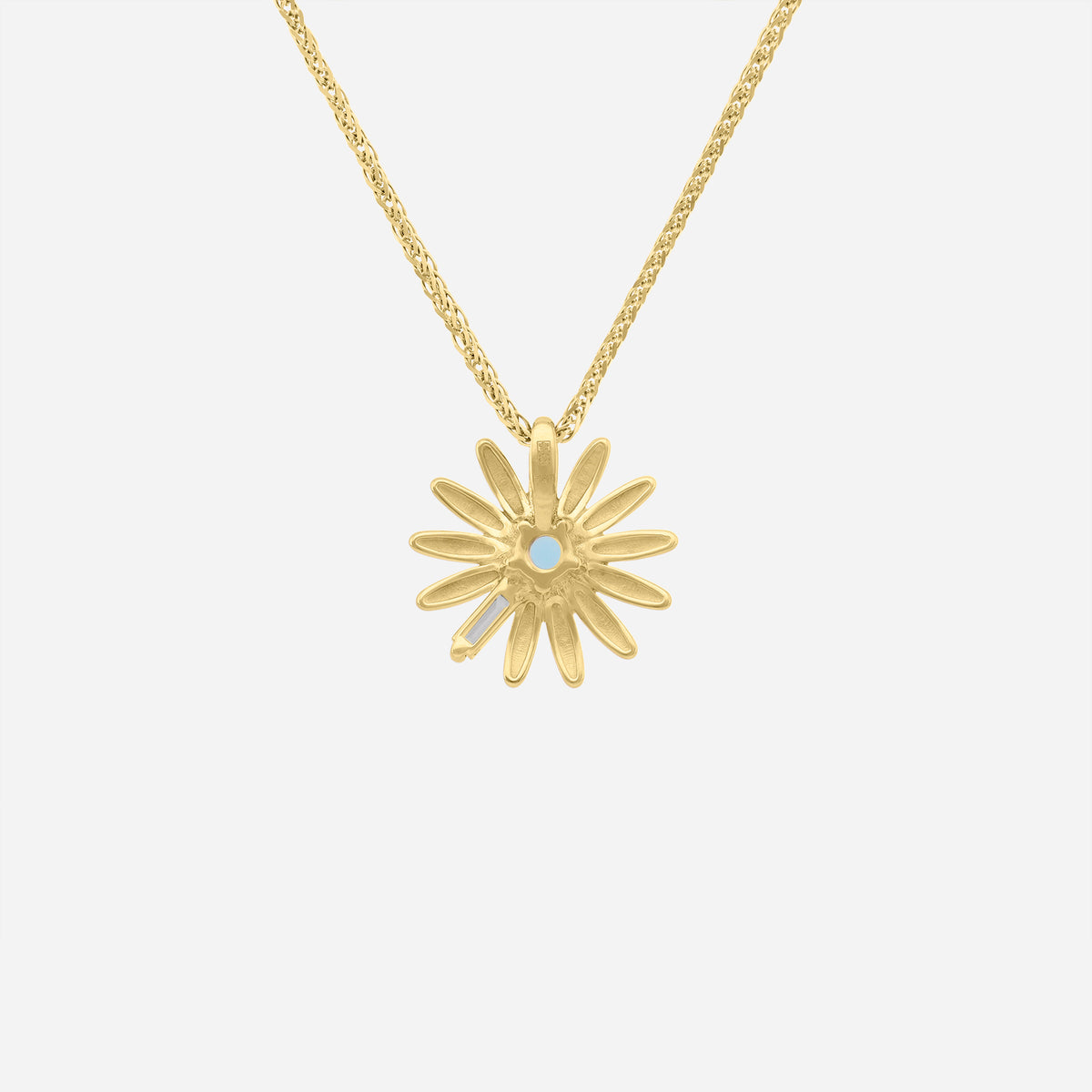 daisy pendant in 18k yellow gold with baby blue topaz and baguette-cut diamond accents. elegant floral design.