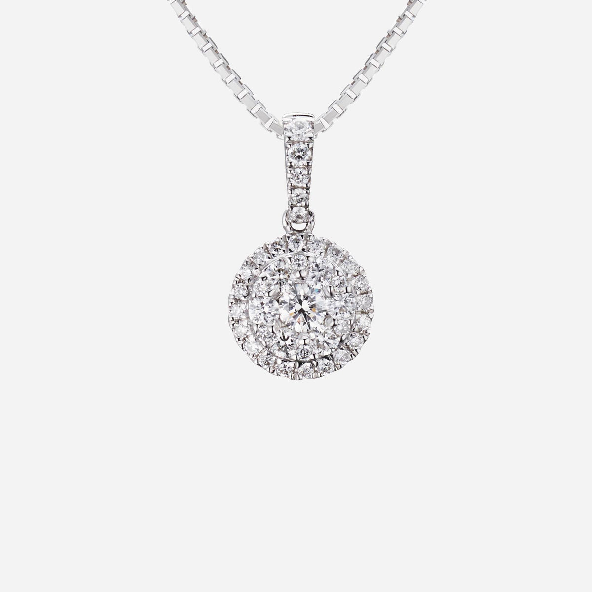 halo diamond pendant in 18k white gold featuring a central 0.10ct diamond with two halo layers of smaller diamonds.