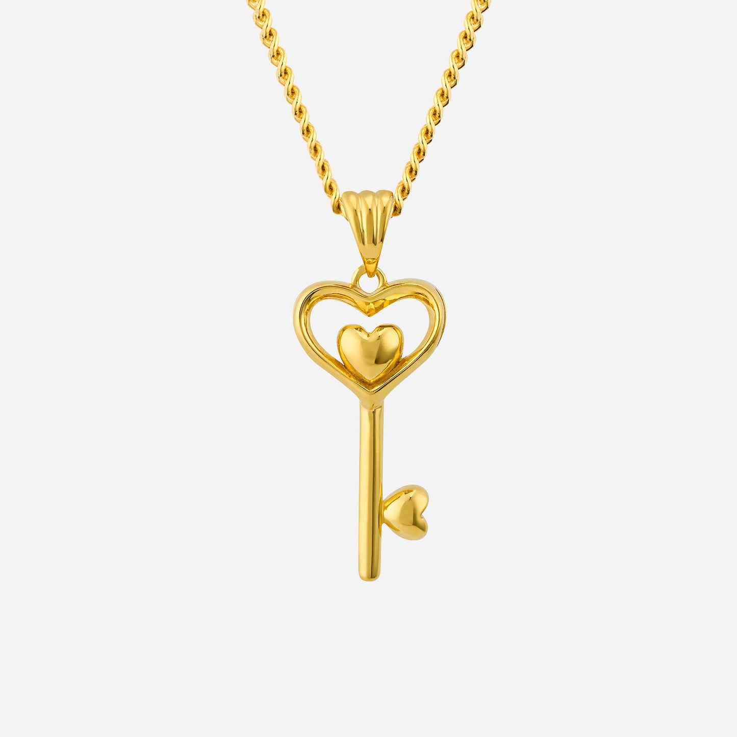 classical open heart key pendant in 22k yellow gold, featuring a heart charm and a twisted chain design.