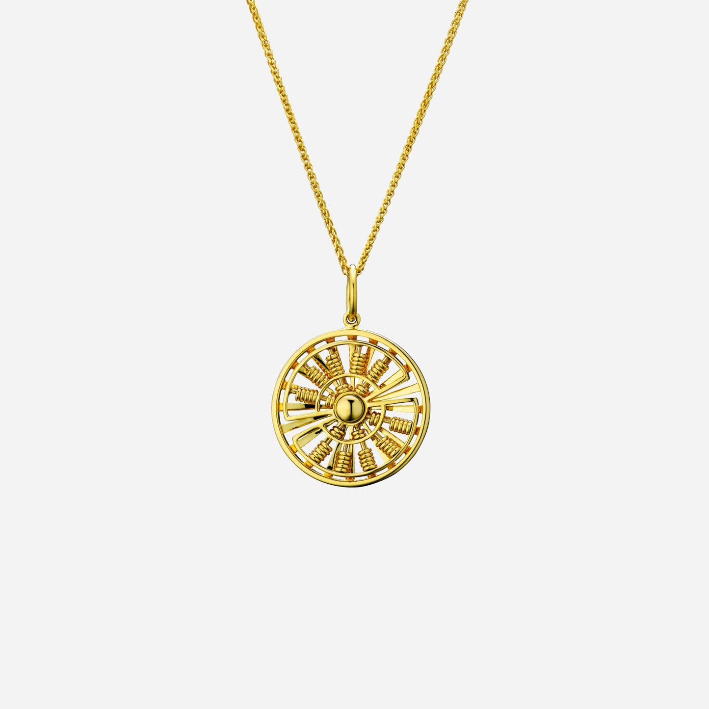abacus wheel pendant in 22k yellow gold with movable beads, featuring an intricate wheel design. chain sold separately.
