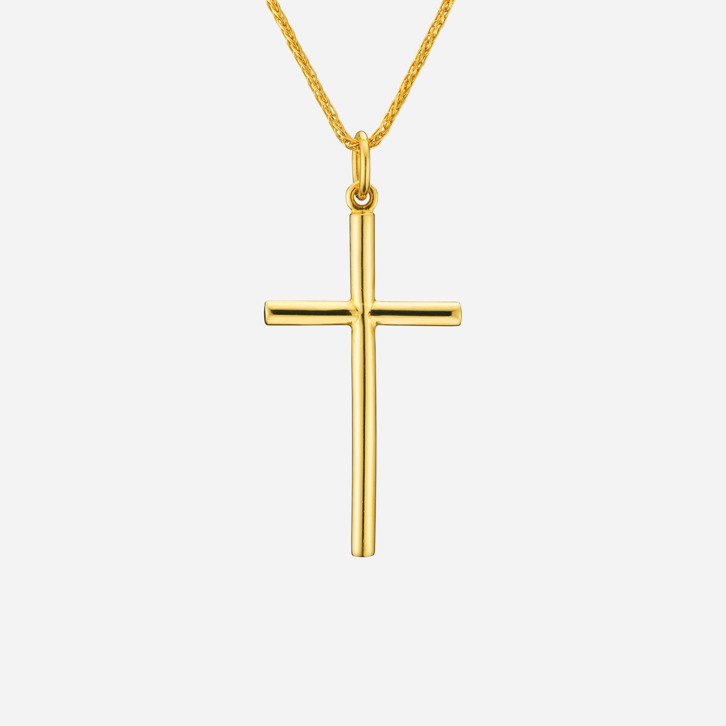 classic cross pendant in 22k yellow gold with a sleek design and a polished finish. chain not included.