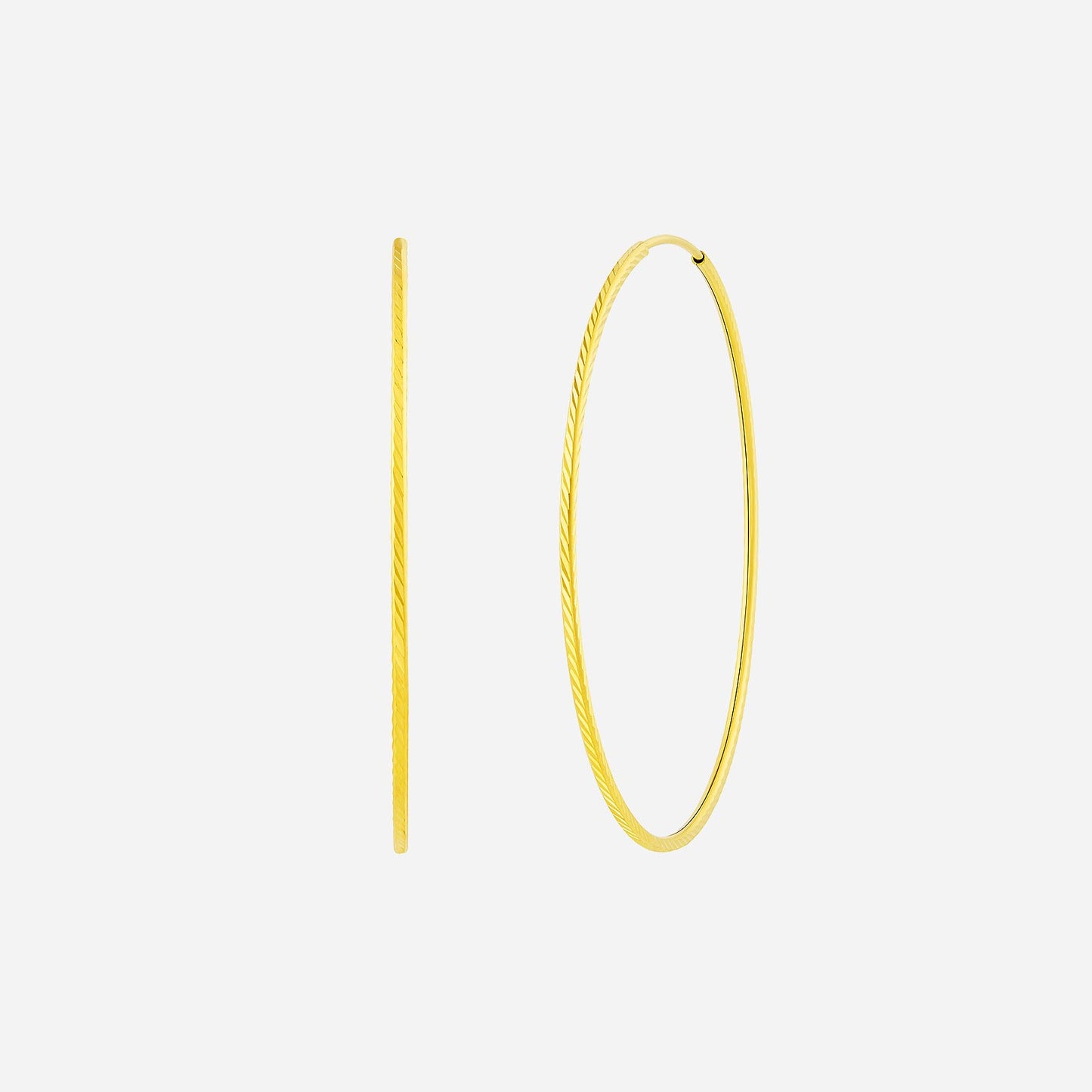 twisted tube hoop earrings in 22k yellow gold with a textured finish, elegantly designed for a chic look.