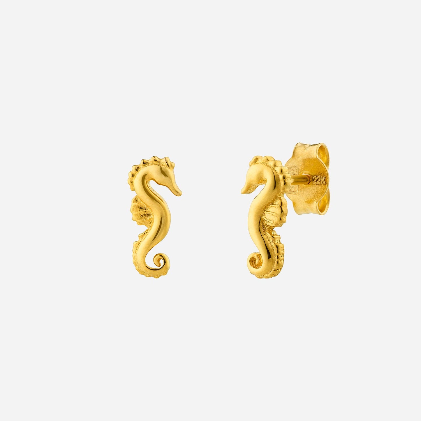 seahorse stud earrings in 22k yellow gold, featuring a detailed underwater-inspired design. perfect for mermaid lovers.