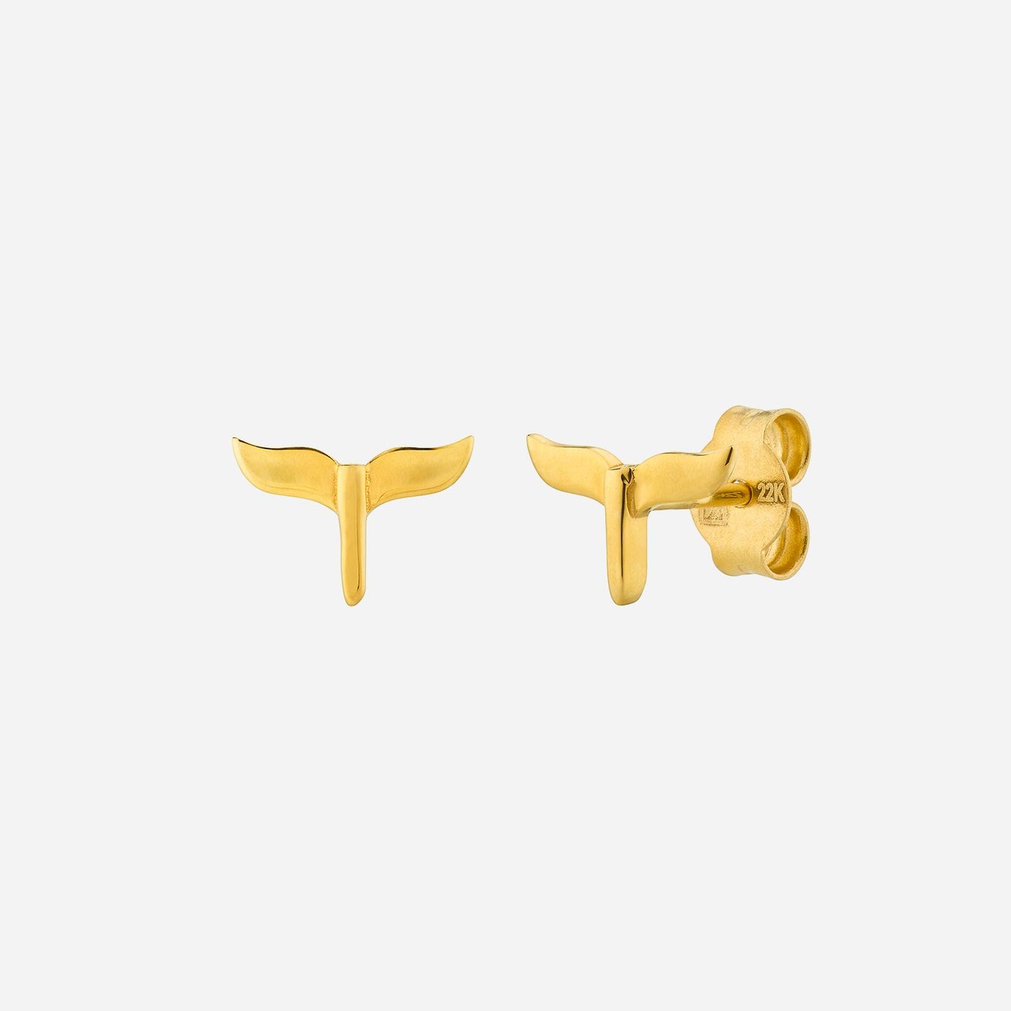 whale tail stud earrings in 22k yellow gold with a sleek ocean-inspired design.