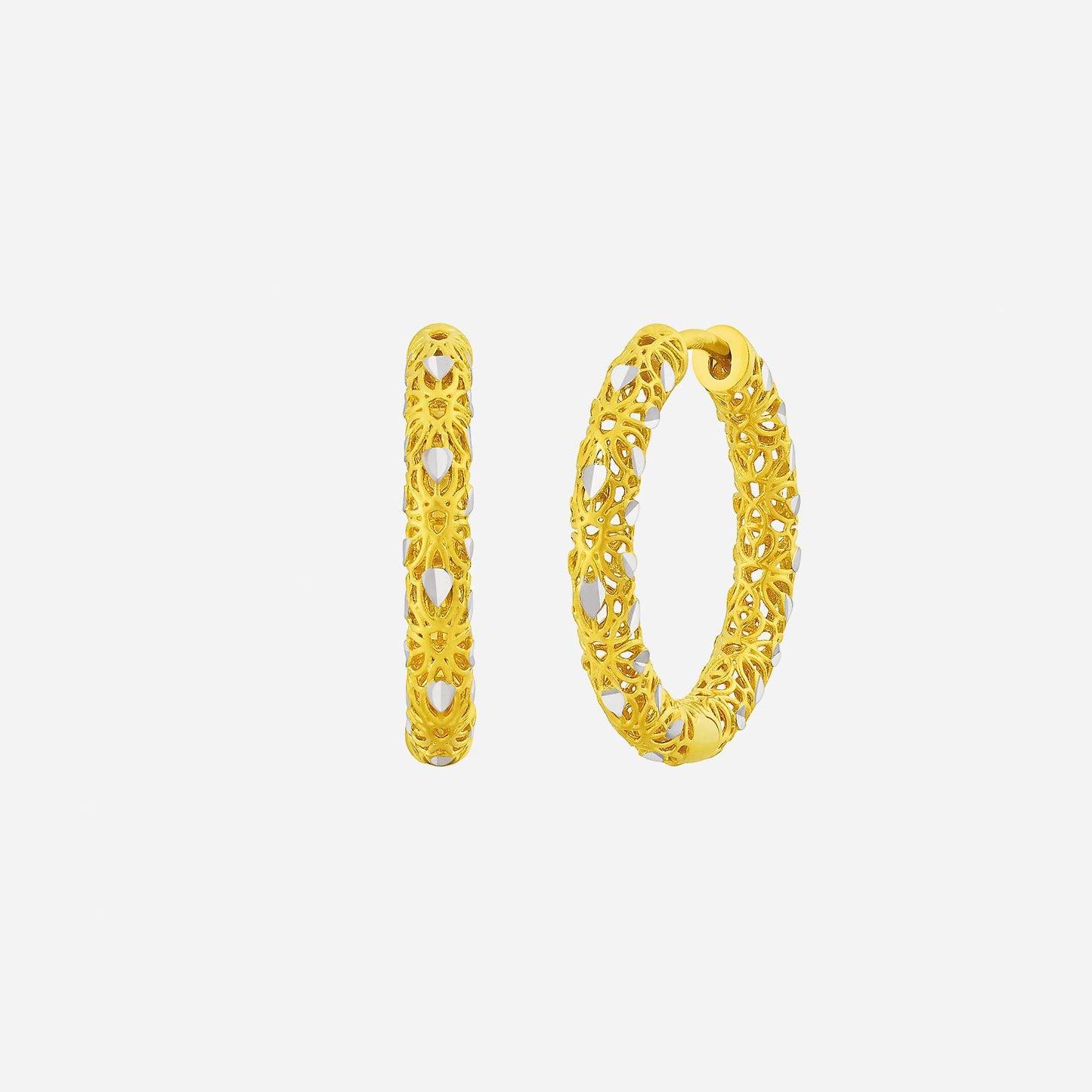 huggie earrings in 22k yellow gold featuring intricate floral and geometric cut-out design. elegant and sophisticated accessory.