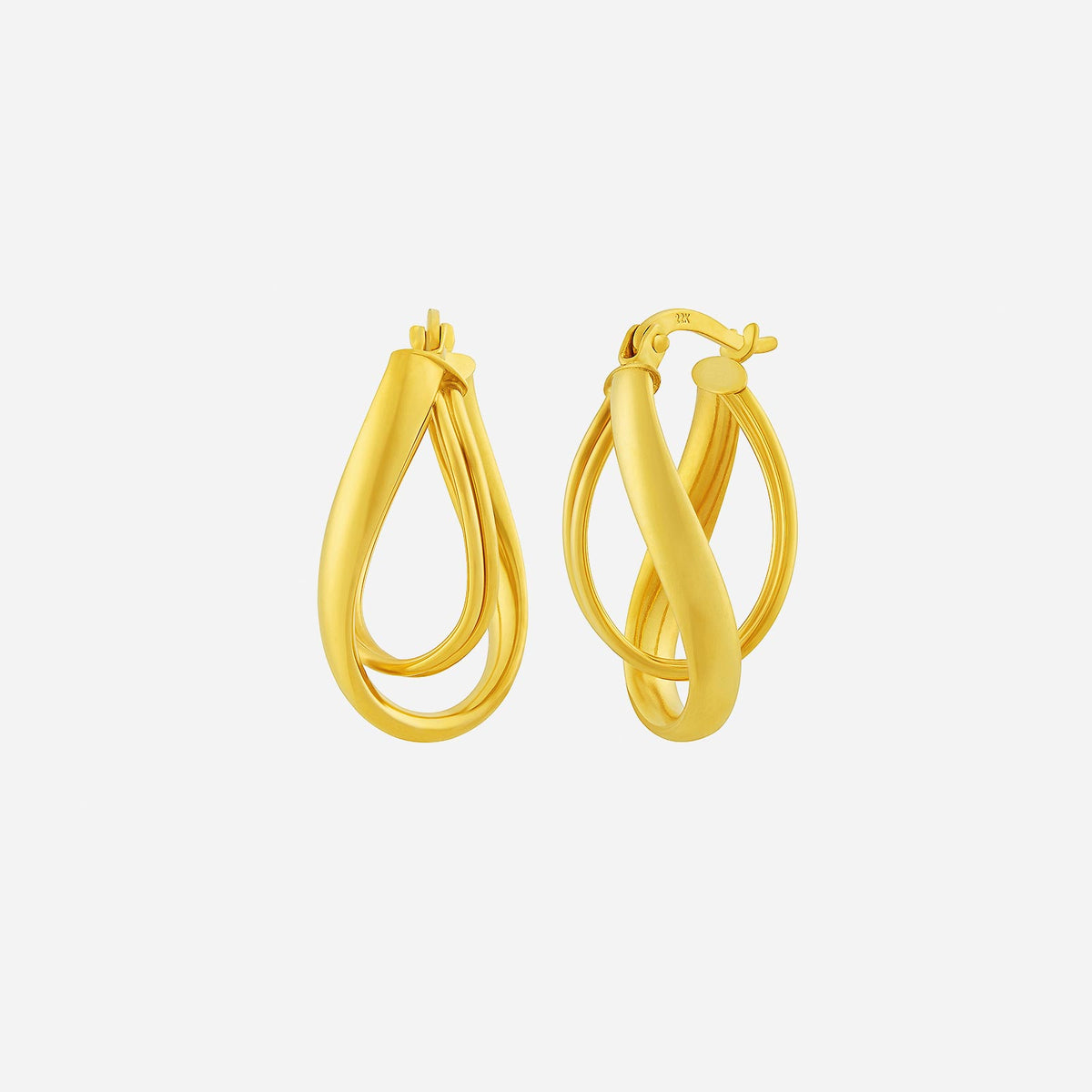 22k yellow gold oval loop huggie earrings featuring fluid curves for a modern, elegant look.