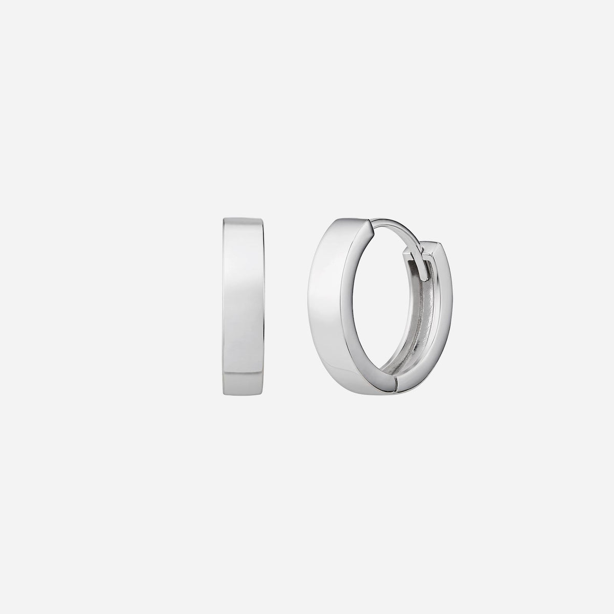 huggie earrings in 18k white gold with a minimalist design, showcasing sleek, polished surfaces for timeless elegance.