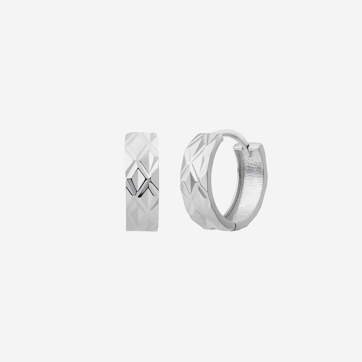 geometric huggie earrings in 18k white gold with a distinctive textured design for a modern look.