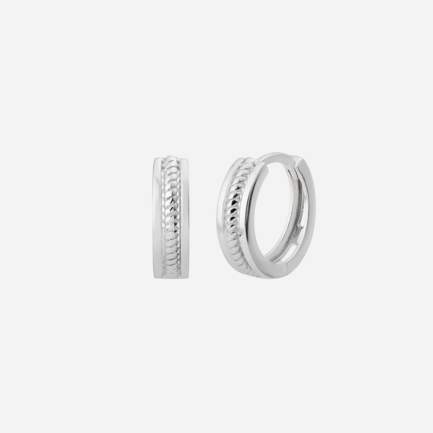 twist huggie earrings in 18k white gold with a unique twisted design, perfect for daily wear and special occasions.
