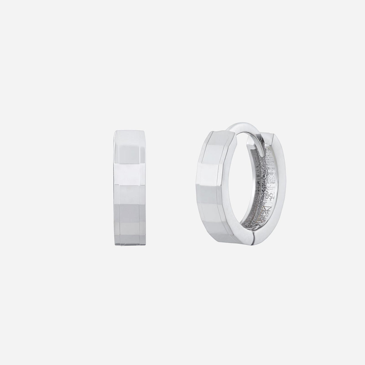 sleek 18k white gold hoop earrings with a minimalistic design and polished finish. perfect for refined accessories.