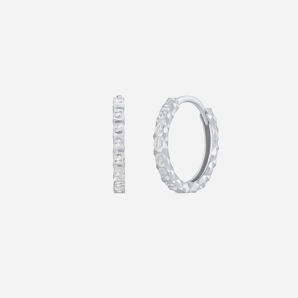 hoop earrings in 18k white gold featuring a textured pattern for subtle shimmer and timeless elegance.