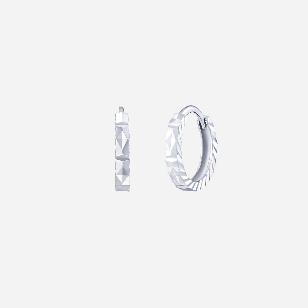 luxe gleam huggie hoop earrings in 18k white gold with faceted surfaces for a striking textural effect.