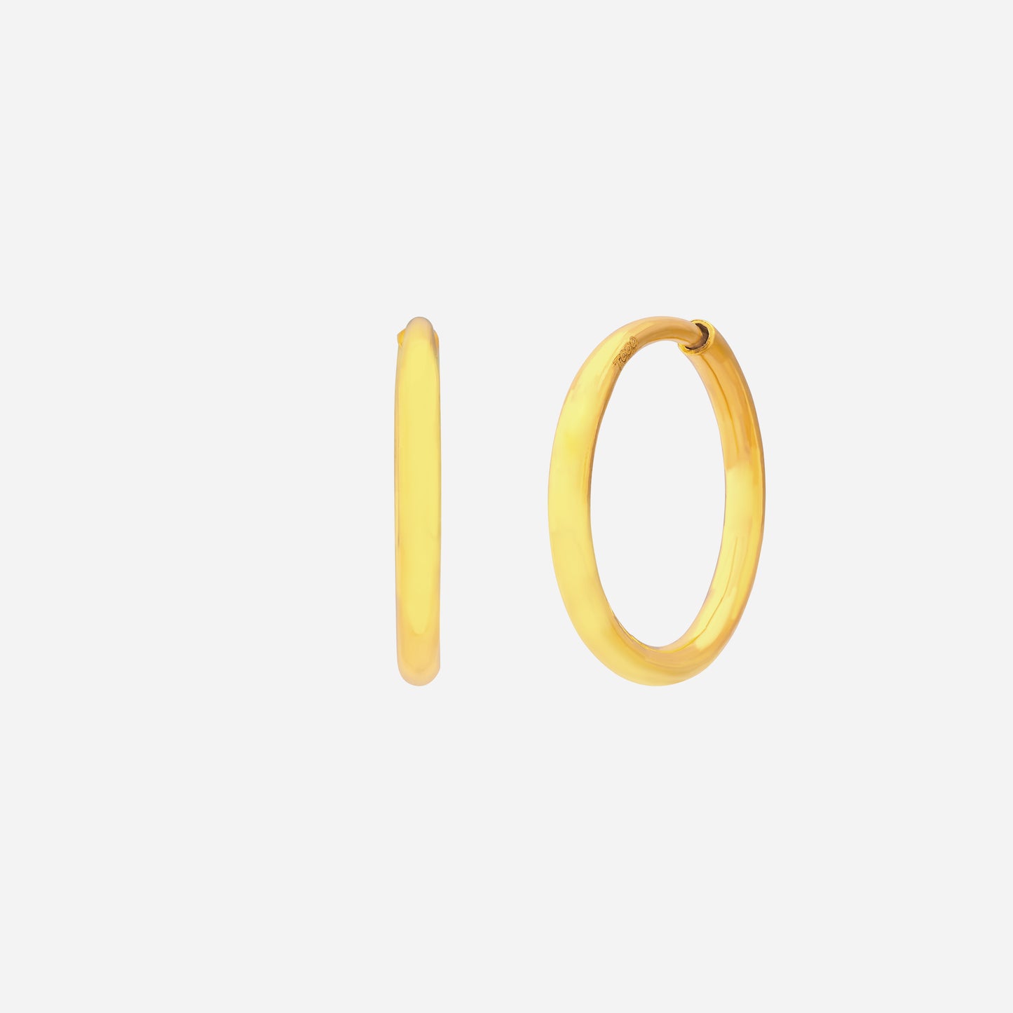 tube hoop earrings in 24k yellow gold with smooth polished curves and a classic circular design.