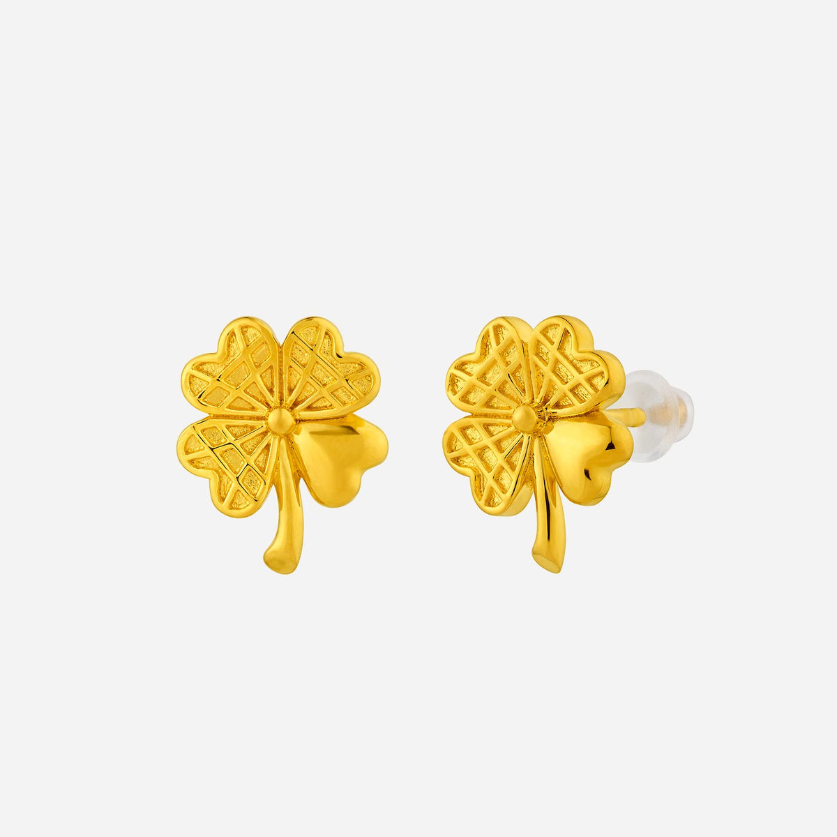 tweed clover earrings in 24k yellow gold with intricate leaf texture and cheerful design, embodying luck and positivity.