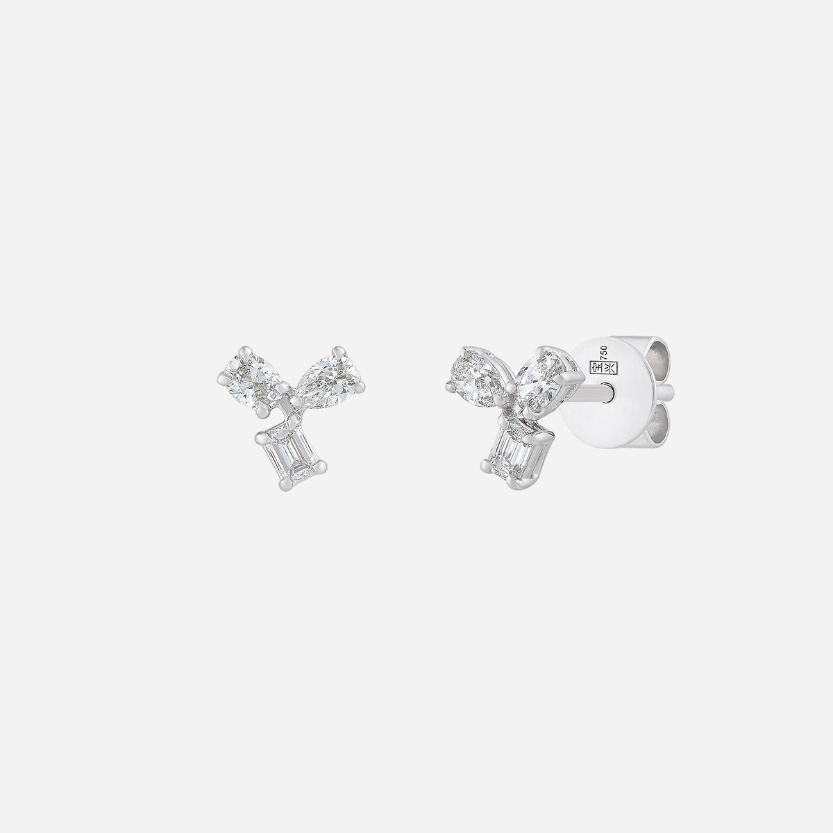 18k white gold mezcla diamond earrings with pear and rectangular cut stones in a chic bow design.
