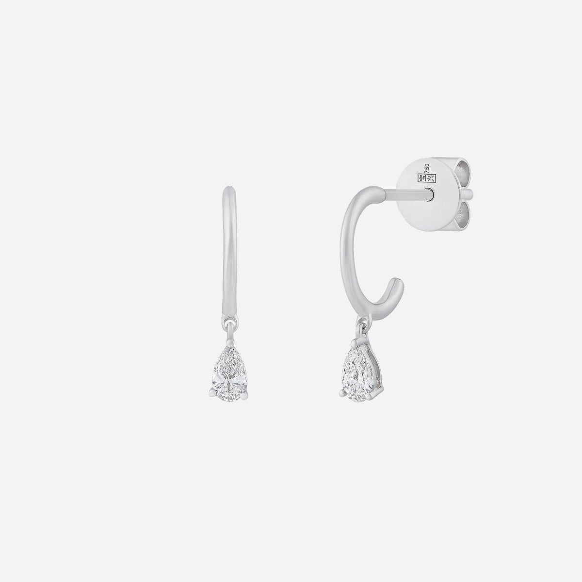 pear drop diamond earrings in 18k white gold with elegant hanging design and sparkling diamond accents.