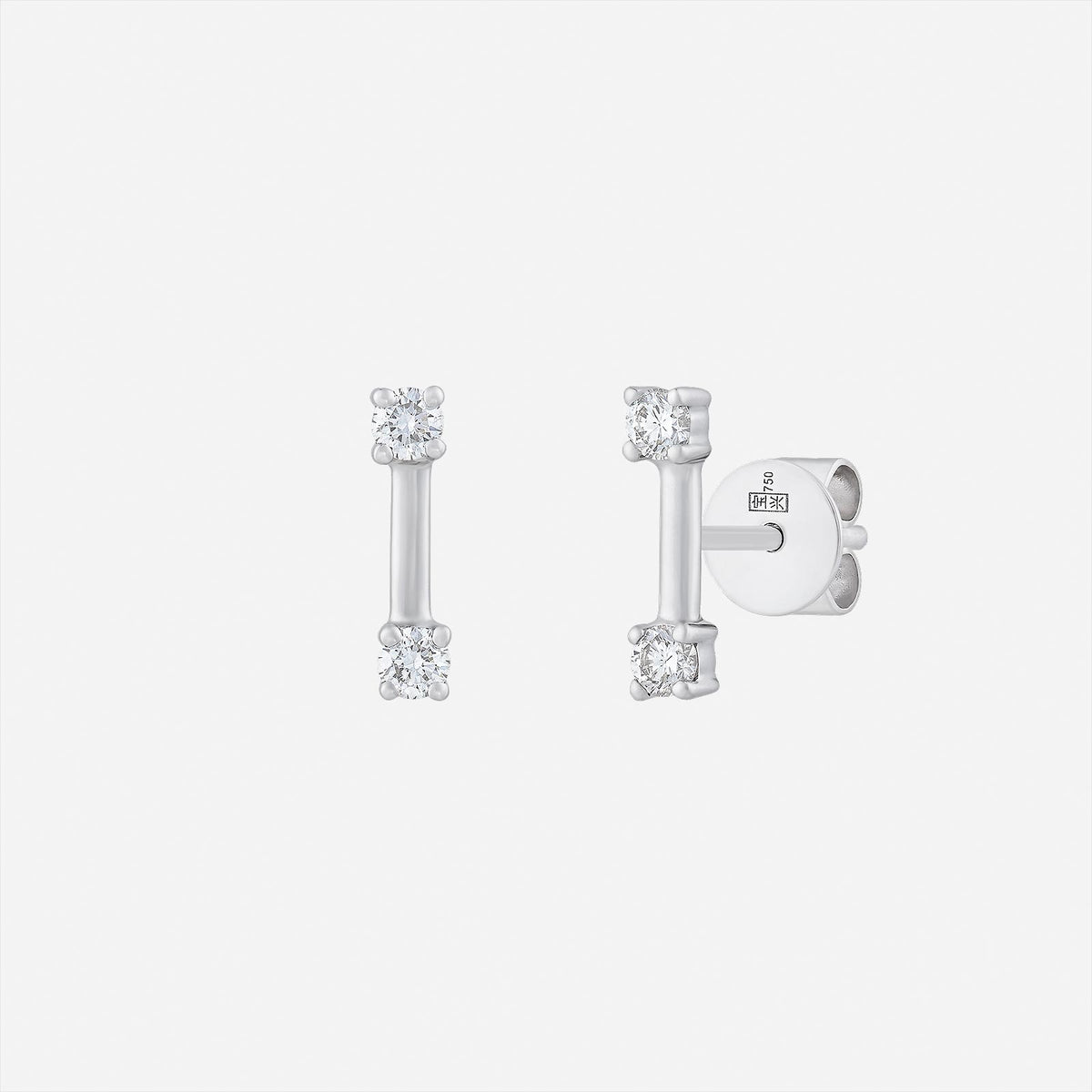 linear spark diamond earrings in 18k white gold with sleek bar design and brilliant diamonds at each end.