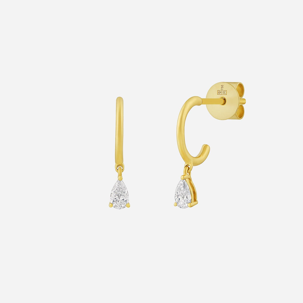 pear drop diamond earrings in 18k yellow gold with elegant pear-shaped diamonds for a graceful look.
