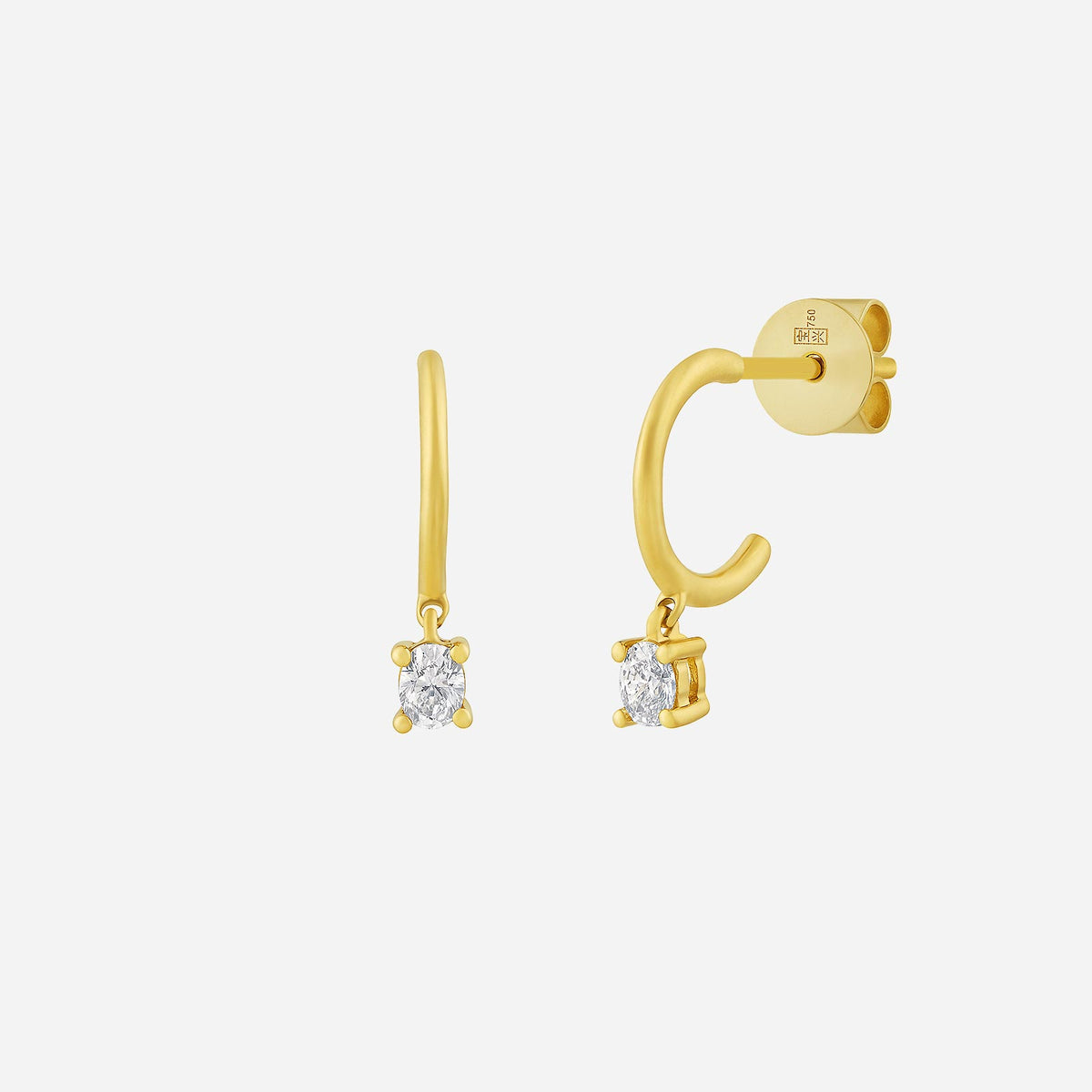 oval drop earrings in 18k yellow gold featuring sparkling diamond accents with a timeless drop design.