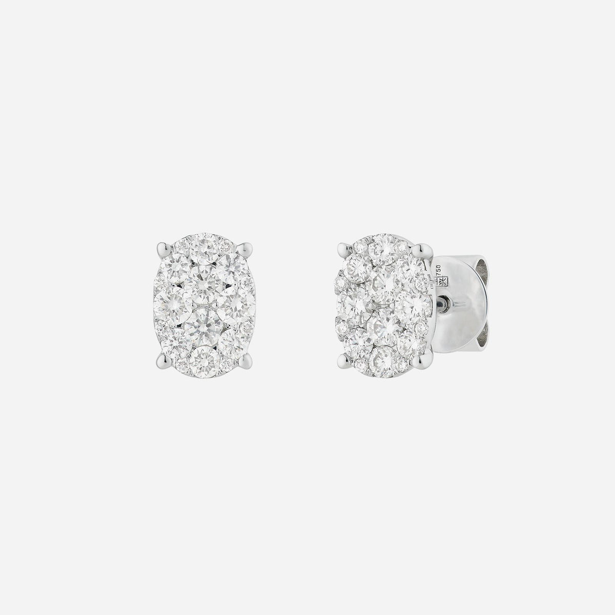 victoria diamond earrings in 18k white gold with oval diamond clusters, showcasing timeless elegance.