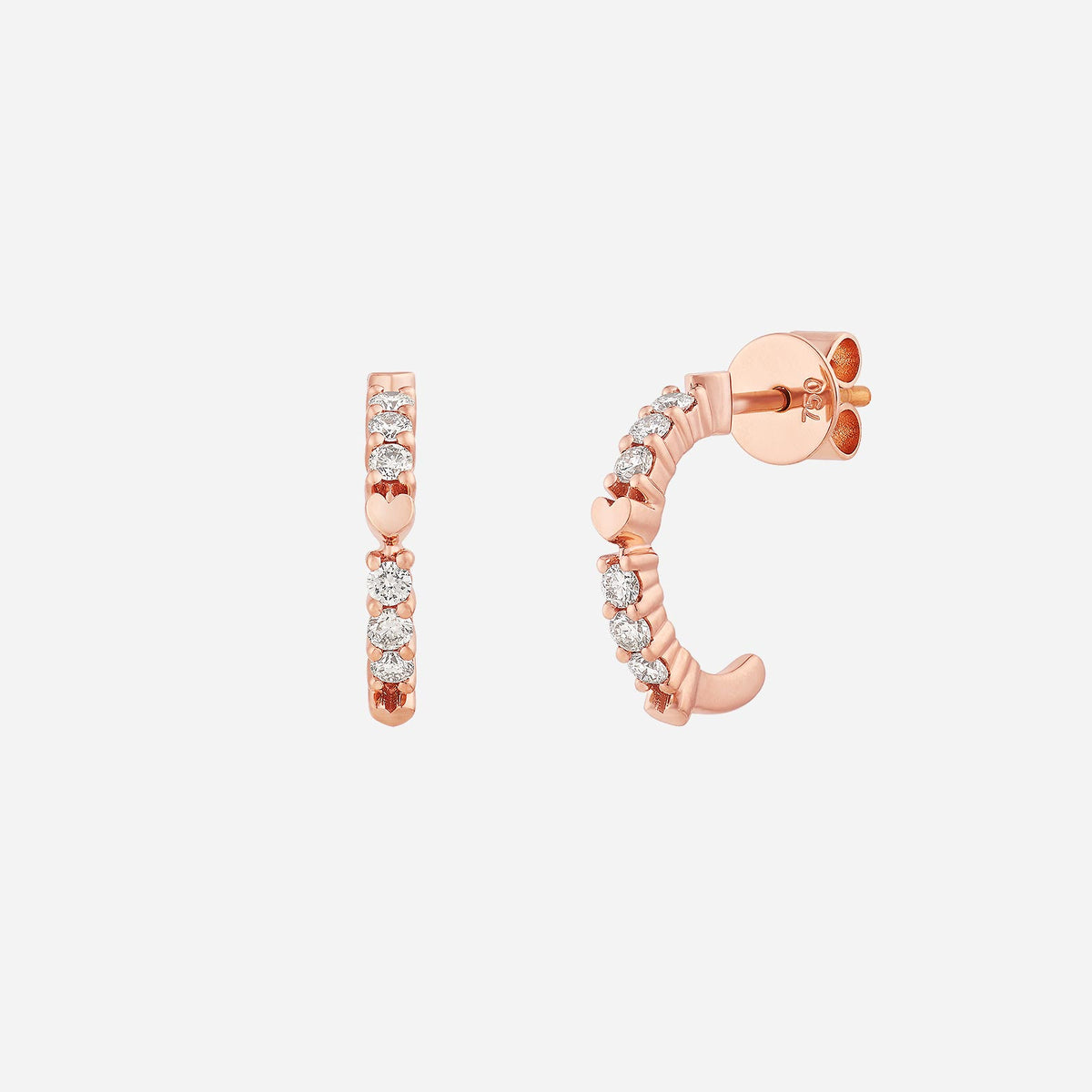 je t'aime diamond earrings in 18k rose gold featuring heart-shaped design and sparkling diamonds.