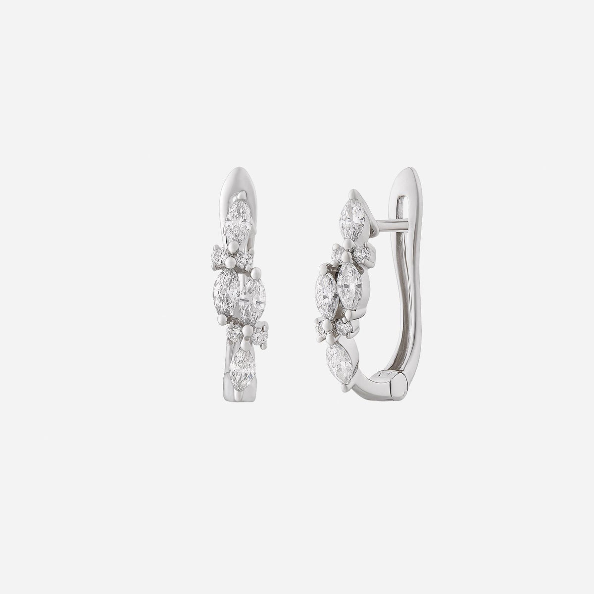 fuchsia diamond earrings in 18k white gold with marquise diamonds in sculpted petal design.