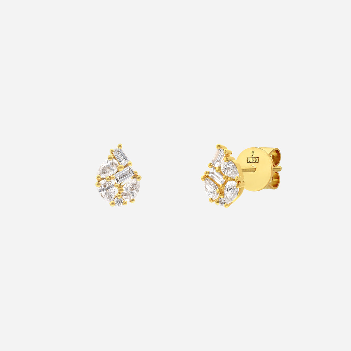 teardrop diamond earrings in 18k yellow gold with brilliant, pear, and baguette-cut diamonds. elegant and luminous design.