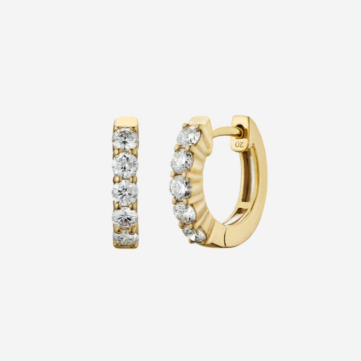 diamond huggie earrings in 18k yellow gold featuring a row of sparkling diamonds with an eternity knot design.
