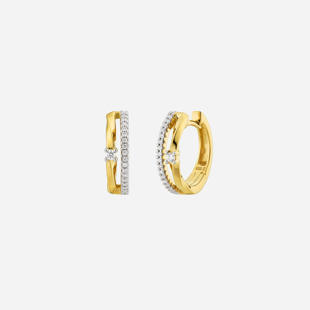 double line diamond huggie earrings in 18k yellow and white gold with side diamonds, showcasing elegant design and sparkle.