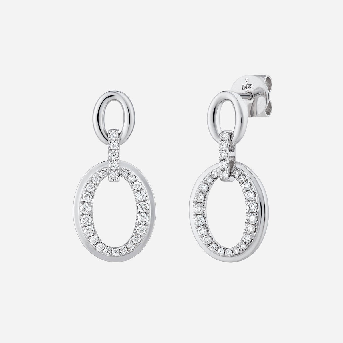 celestial diamond earrings in 18k white gold with shimmering diamonds in an elegant oval design.