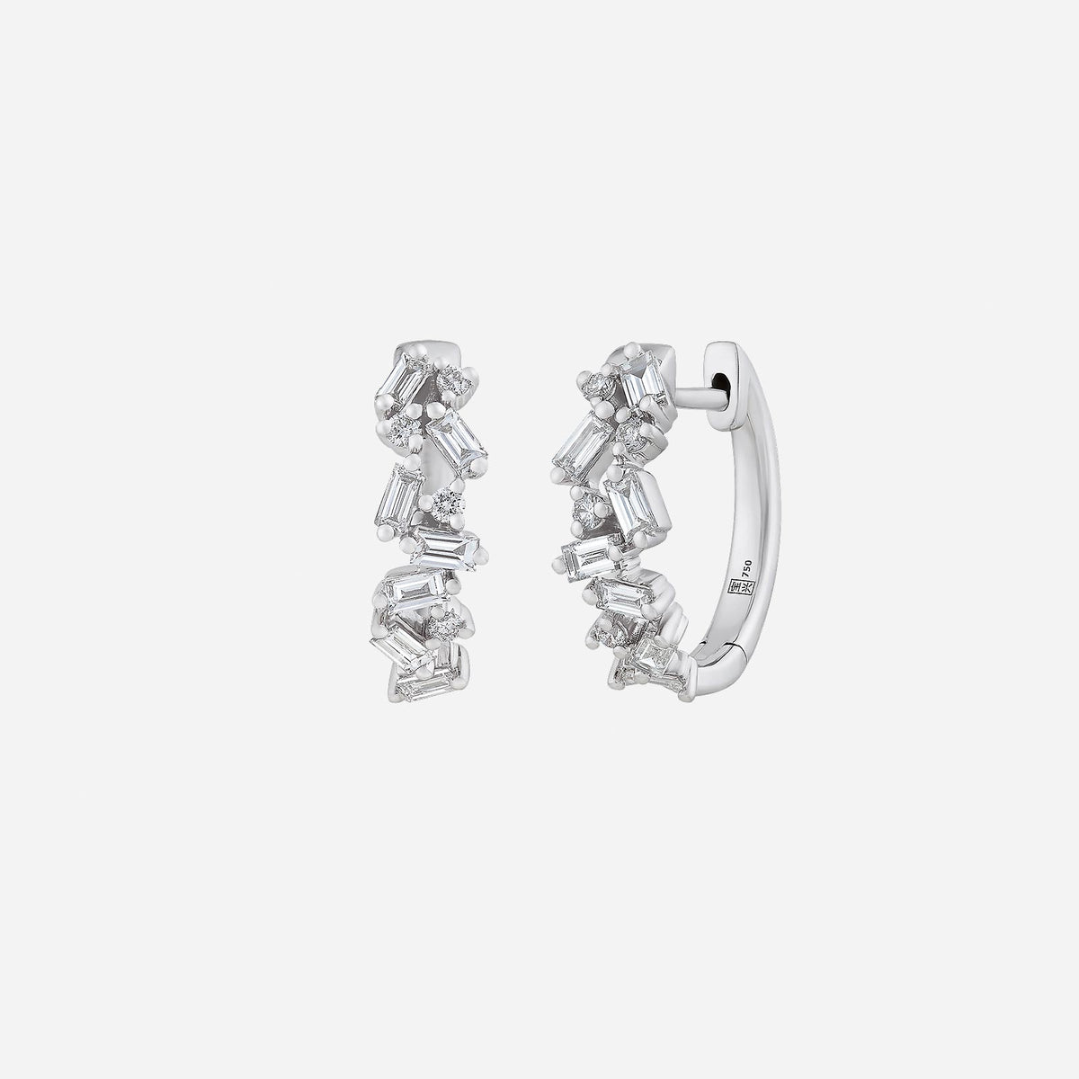 mischen diamond earrings in 18k white gold with sparkling baguette and round diamonds in an elegant design.