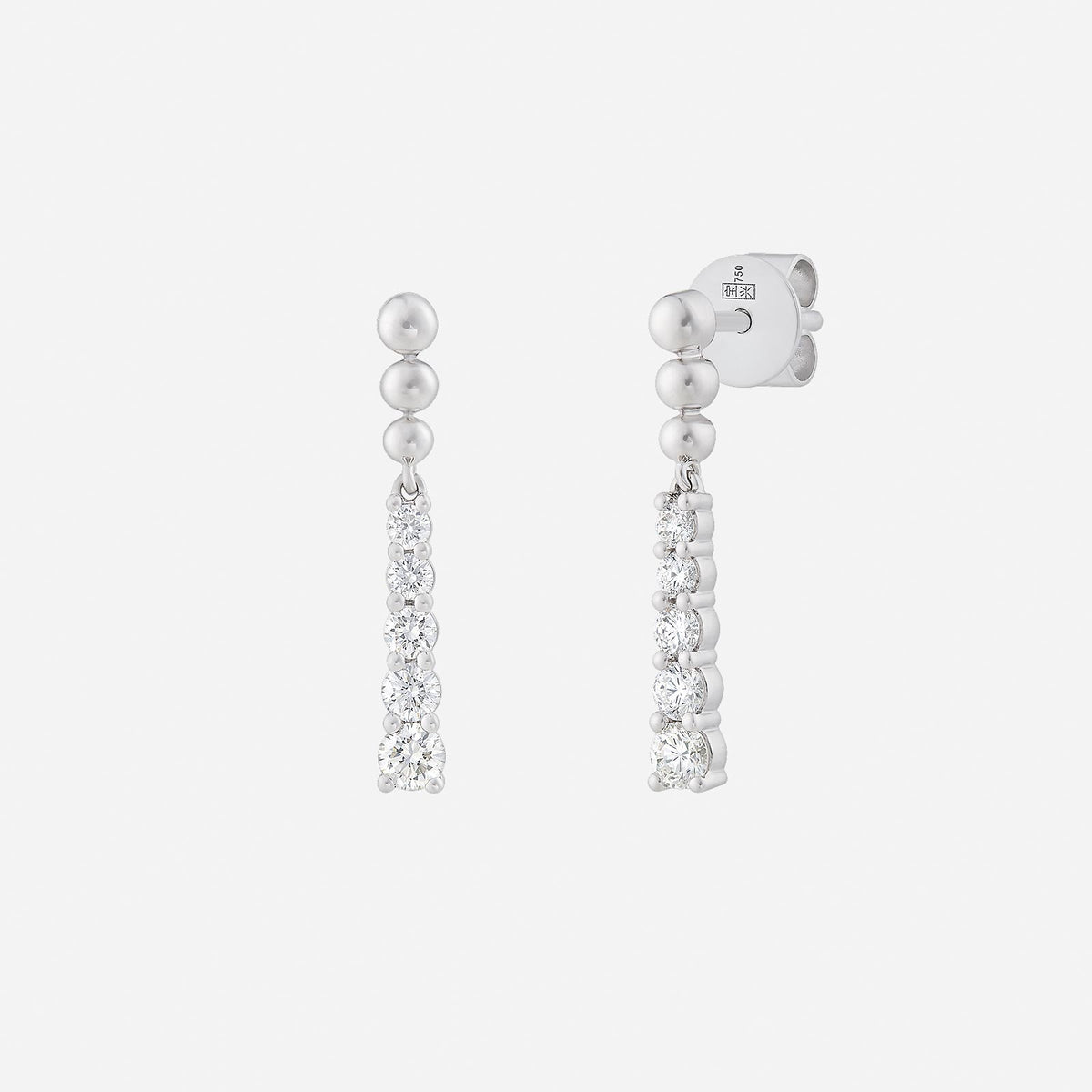 gleaming frost diamond earrings in 18k white gold with tapered diamonds for an icy, elegant design.